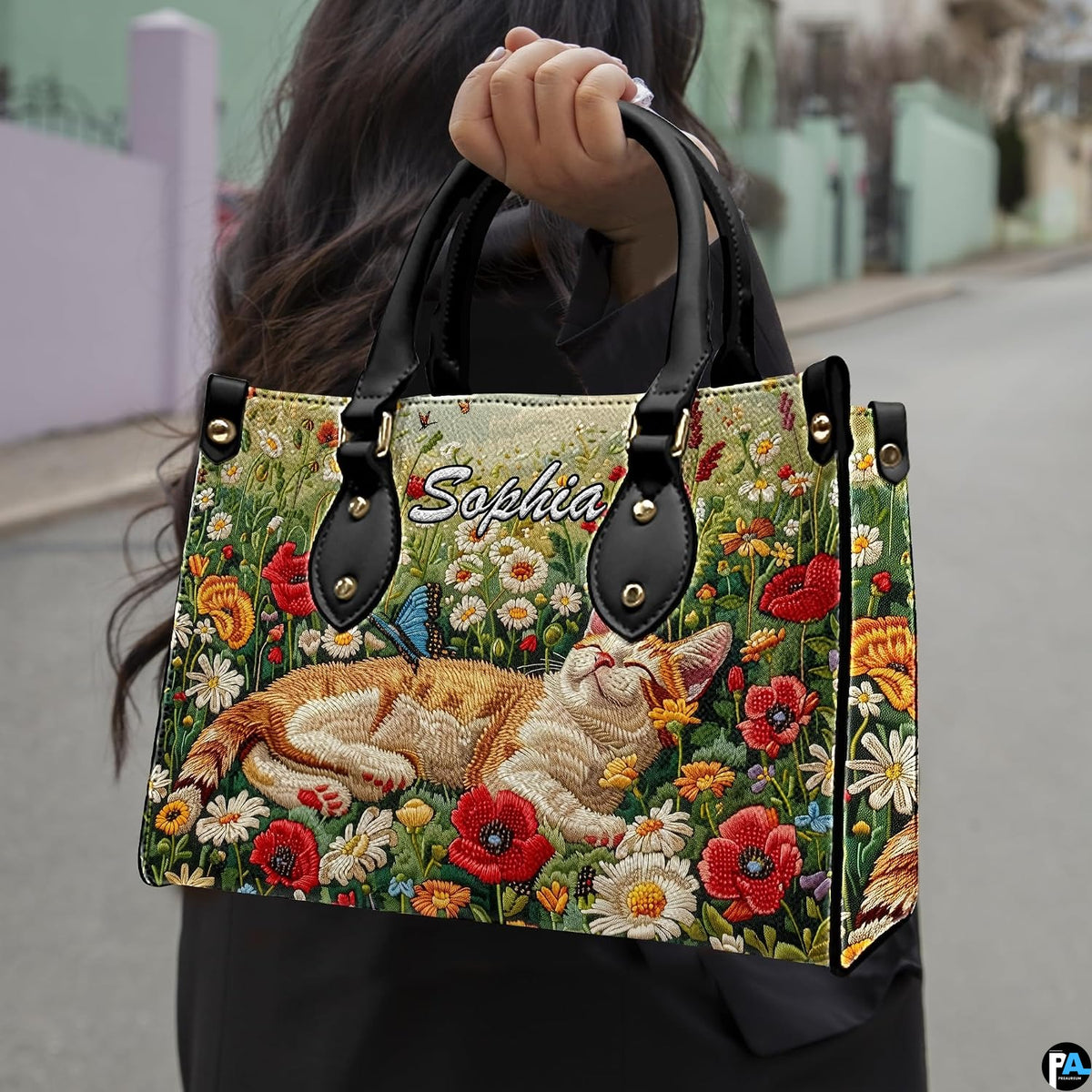 Outdoor lifestyle showcase displaying sleeping cat art floral graphic on fashionable daily accessory.