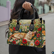 Outdoor lifestyle showcase displaying sleeping cat art floral graphic on fashionable daily accessory.