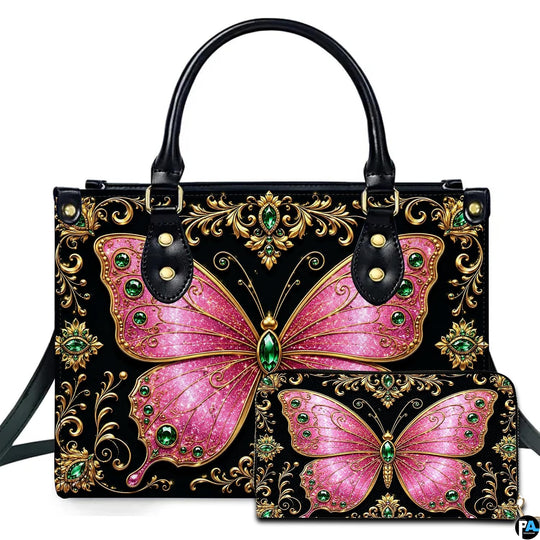 Studio presentation showing pink jeweled butterfly artwork alongside matching companion on white surface.