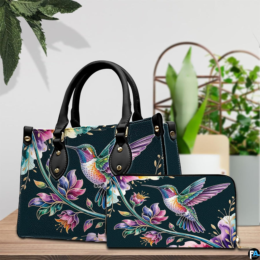 Handbag and matching wallet set displayed together on wooden table beside a green houseplant.