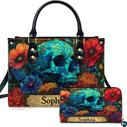 Stained glass mosaic skull floral handbag and matching wallet set on white background.