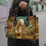 Perspective view of Good Shepherd wildflower garden handbag and wallet pair