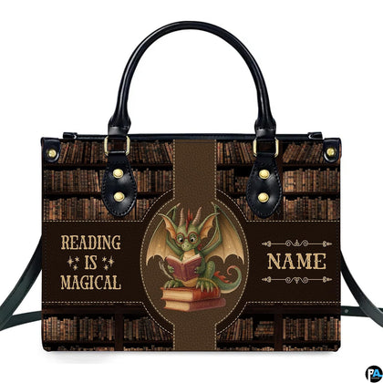 Front view of structured handbag showing green dragon with spectacles reading books against antique library backdrop