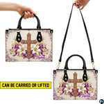 Carrying options demonstrated with the floral golden cross devotional handbag.