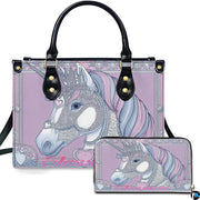 Crowned pastel unicorn handbag and matching wallet set on white backdrop