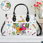 Handbag interior compartment arranged for daily personal and teaching supplies.