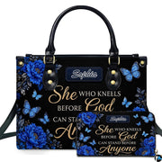 Front view of royal blue peony handbag and matching wallet with azure butterflies and golden calligraphy.