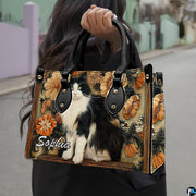 Outdoor lifestyle presentation showcasing black white cat art botanical illustration on daily accessory.