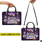 Carrying options demonstration illustrating top handle and shoulder wear for the purple scripture handbag.