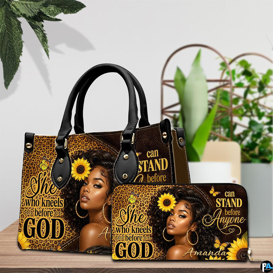 Melanin leopard faith print art resting on a wooden surface beside lush green foliage.
