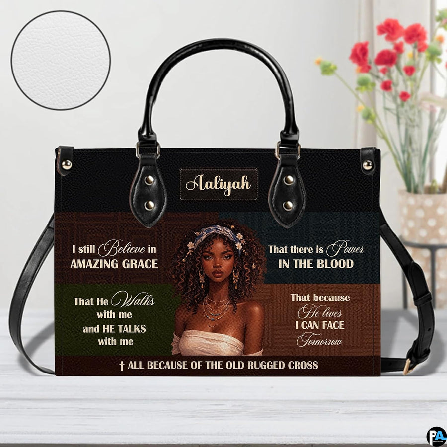 Tabletop presentation highlighting hymn artwork resting beside leafy indoor greenery.
