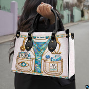 Angled view of optometrist handbag showcasing ocular examination graphics and gold stethoscope