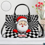Optical illusion Santa handbag displayed in studio setting with circular texture swatch inset.