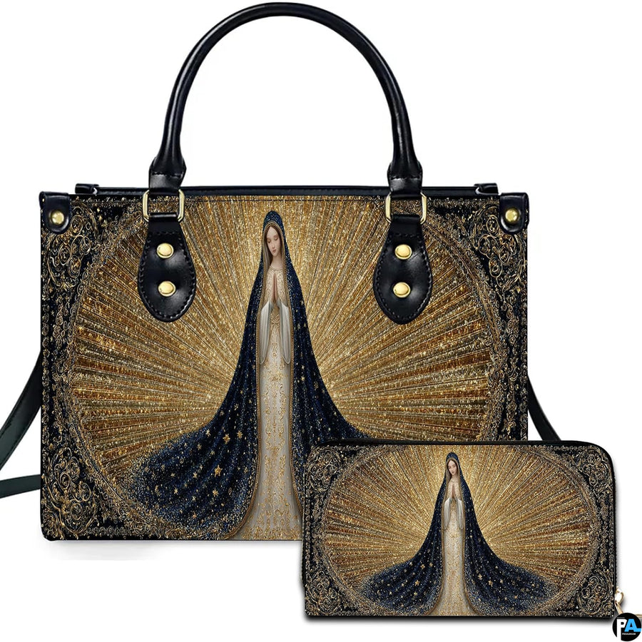 Front view of religious handbag featuring Virgin Mary in starry navy mantle with golden sunburst