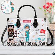 Chibi scrub cap nurse handbag displayed indoors alongside floral vase with texture swatch.
