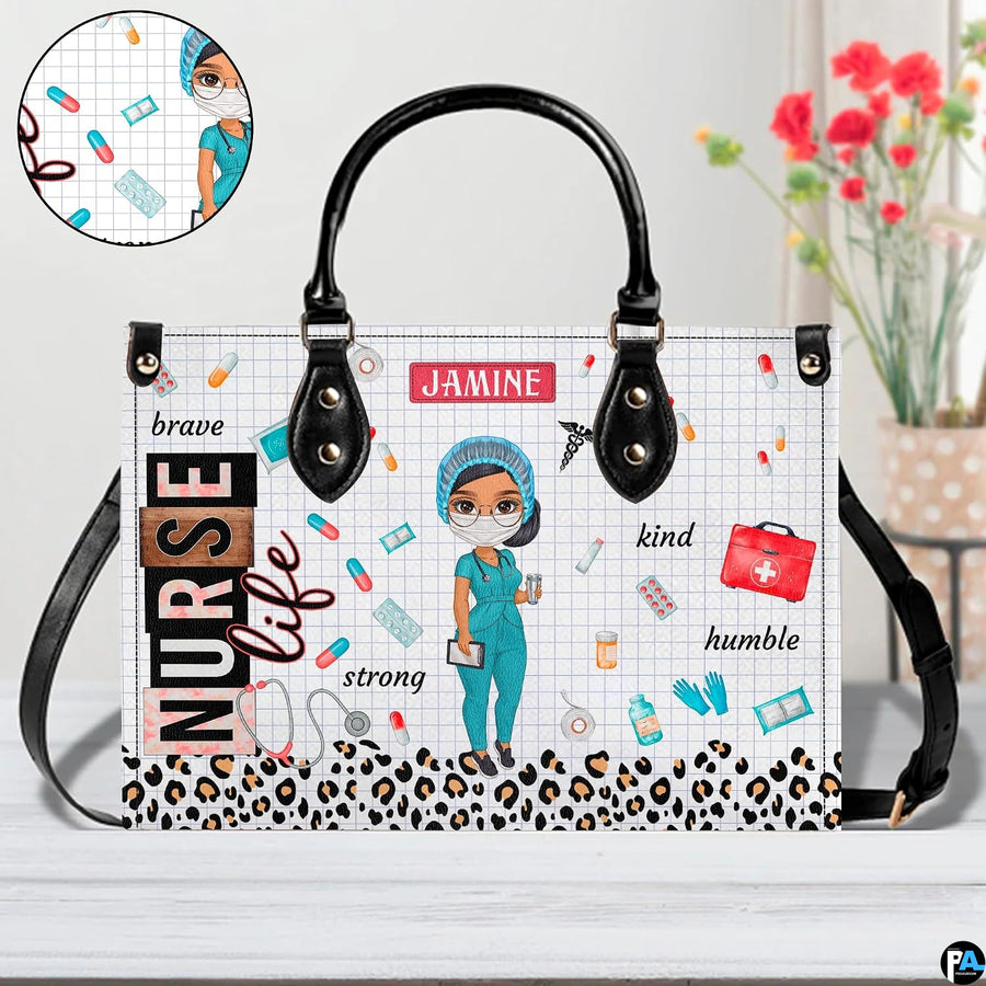 Chibi scrub cap nurse handbag displayed indoors alongside floral vase with texture swatch.