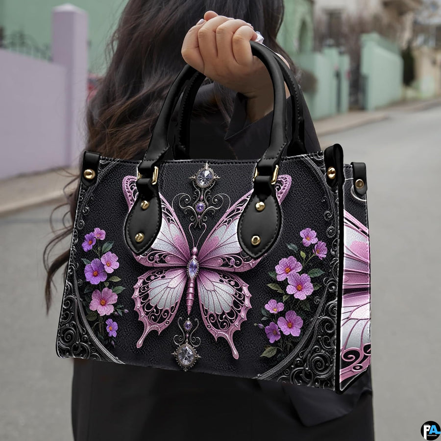 Matching zip-around wallet featuring sculpted pastel pink filigree butterfly and purple flowers on black