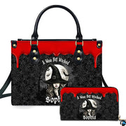 Front view of gothic sorceress artwork with dripping crimson border, full moon, and spiderweb pattern.
