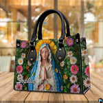 Devotional Virgin Mary floral art handbag resting in bright indoor space