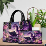 Reading dragon handbag and wallet set displayed on wooden table beside houseplant.