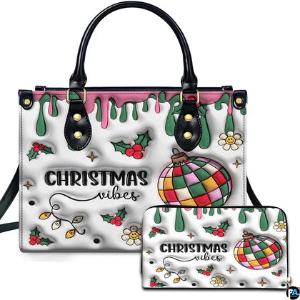 Black holiday handbag with patchwork ornament, holly, daisies and matching rectangular accessory