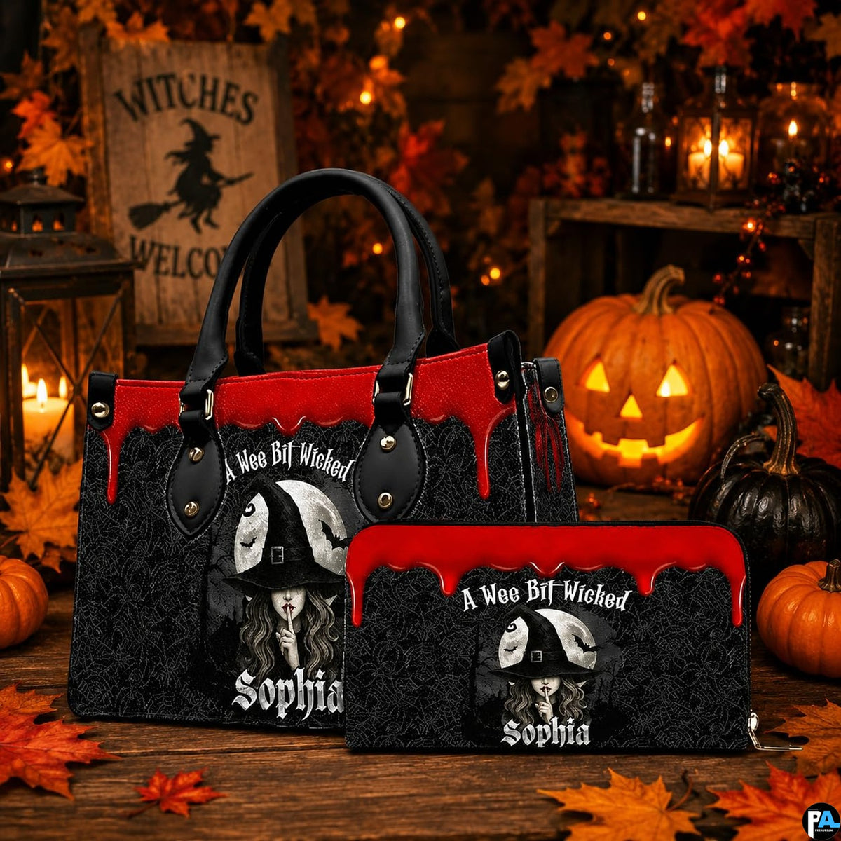 Tabletop arrangement showing gothic sorceress artwork paired with pumpkins and wooden autumn sign.