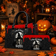 Tabletop arrangement showing gothic sorceress artwork paired with pumpkins and wooden autumn sign.