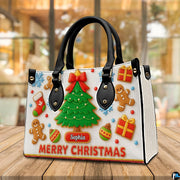 Perspective display of gingerbread Christmas tree handbag on wooden table.