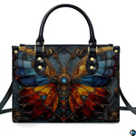 Back view of matching stained glass butterfly zip wallet displaying colorful decorative design