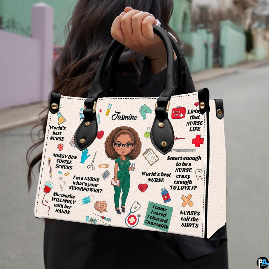 Nurse scrubs illustration handbag held outdoors showing visual scale against street setting.