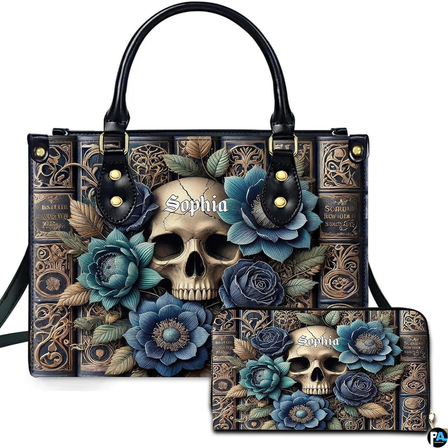 Gothic skull and cerulean rose grimoire handbag and matching zippered wallet displayed together.