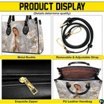 Top view of pearlescent Madonna handbag displaying top zipper opening and carry handles
