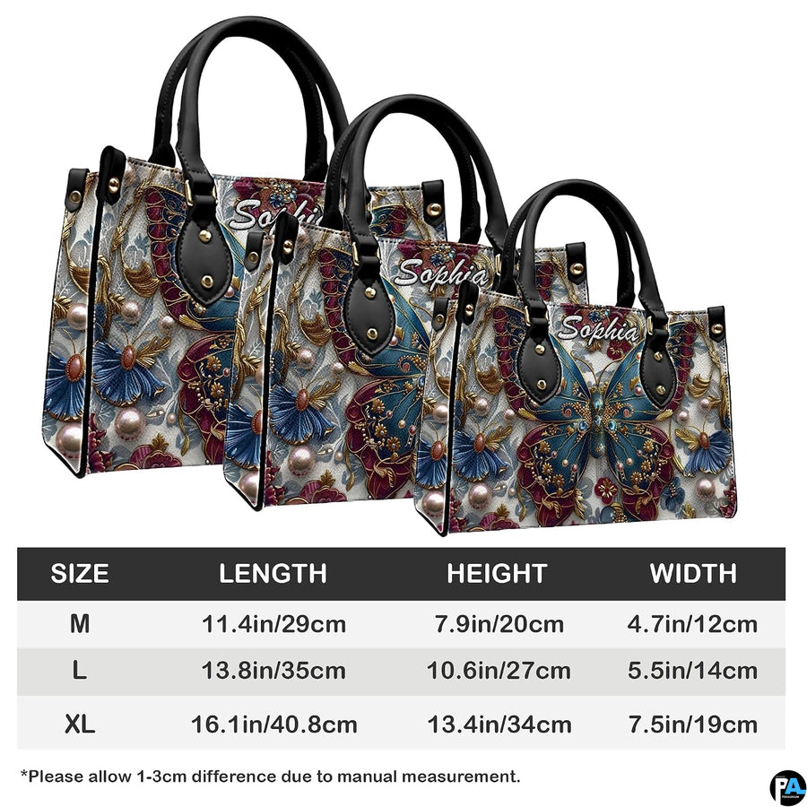 Side perspective view of baroque teal butterfly handbag and wallet pair