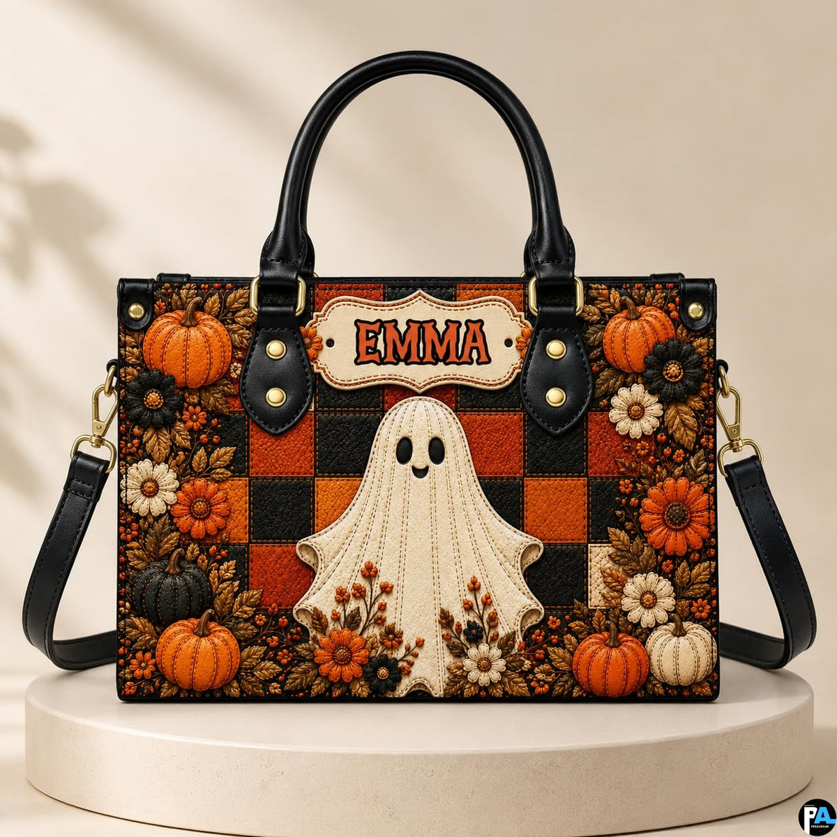 Studio display of the ghost plaid satchel resting upright on a circular neutral pedestal.
