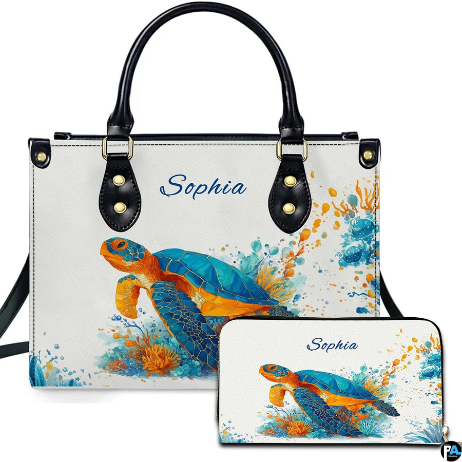 Paint splatter sea turtle handbag and matching wallet set featuring colorful watercolor droplets.