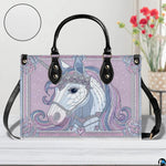 Interior compartment view of unicorn handbag showing inner lining and organization.