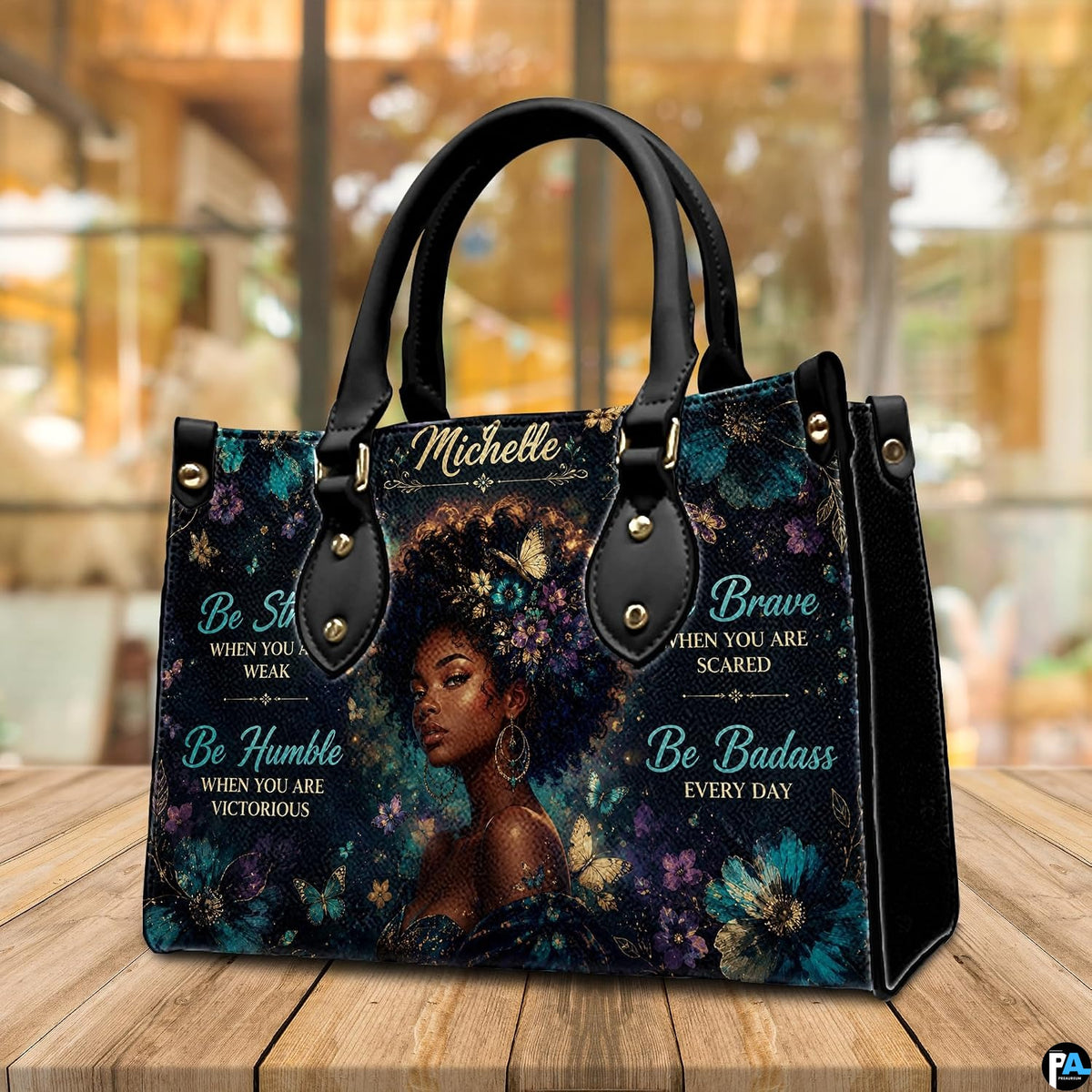 Angled teal floral afro handbag with butterflies and gold details