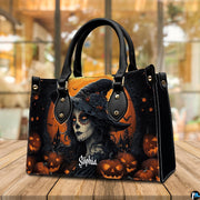 Halloween witch handbag displayed on wooden tabletop in front of sunlit window.