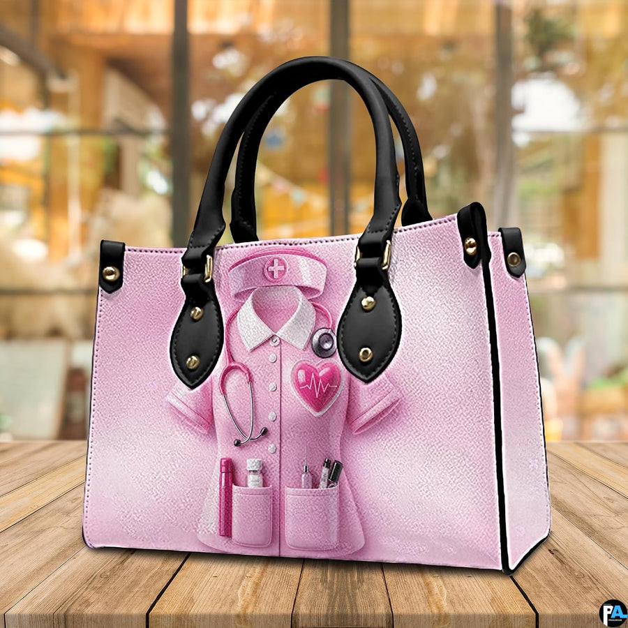 Side profile view of pink nurse handbag highlighting slim structured depth