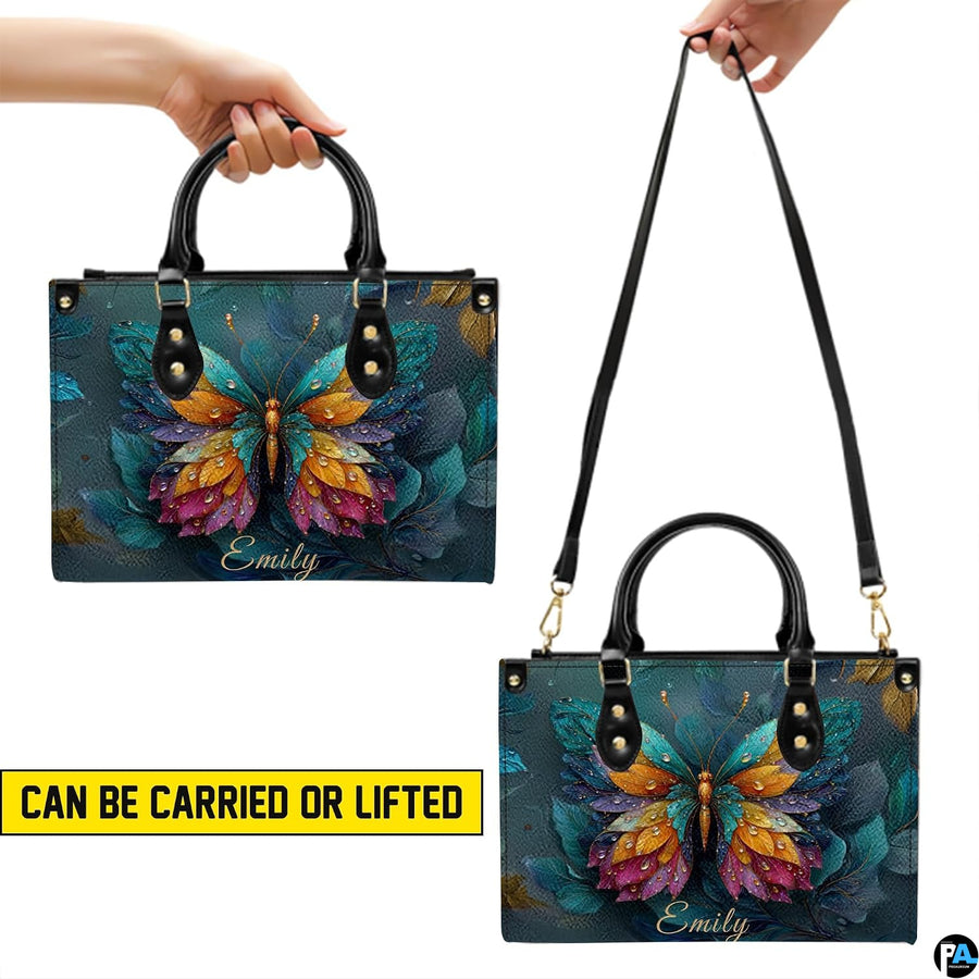 Bottom view of butterfly handbag showing flat rectangular base