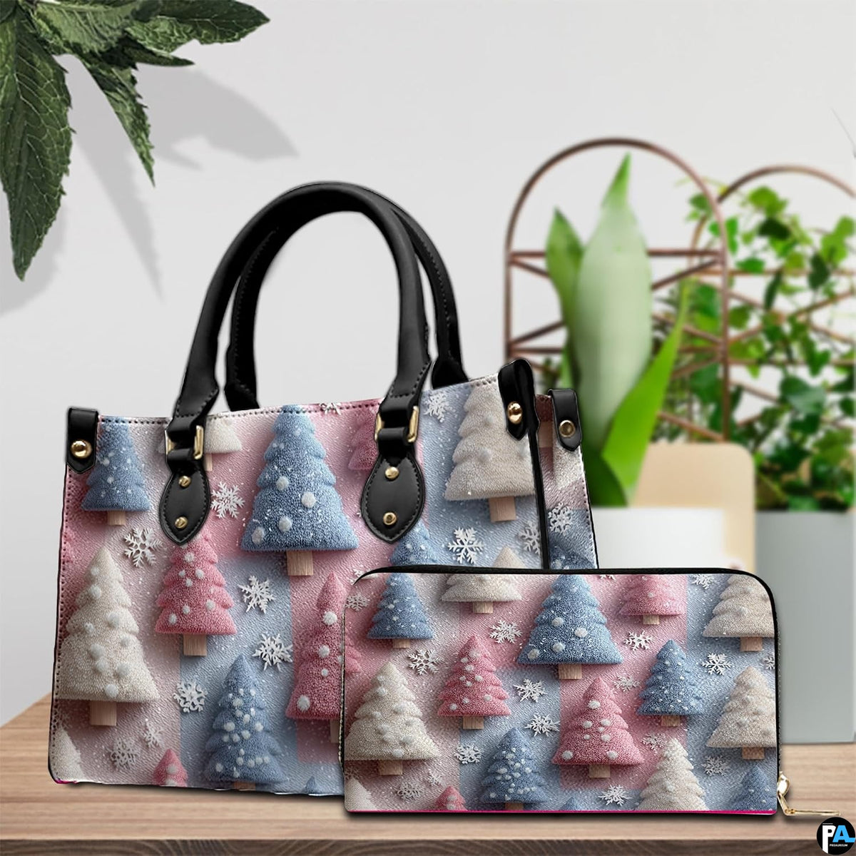 Matching accessory items displaying the frosted pine tree visual design beside an indoor plant