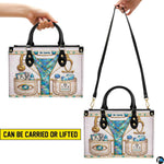 Model carrying optometrist handbag demonstrating professional styling and scale