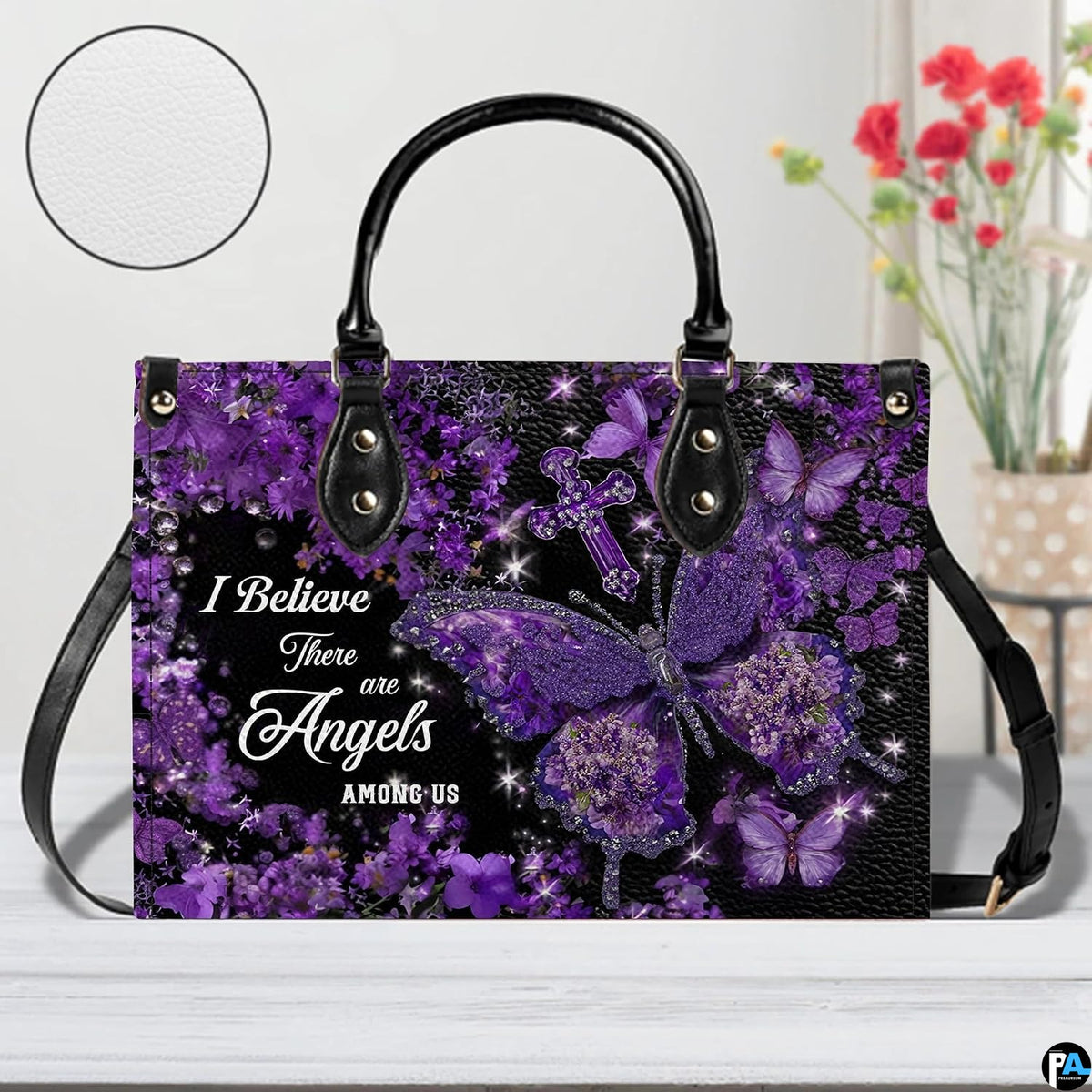 Side profile view of structured purple hydrangea butterfly cross handbag.