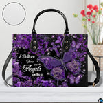 Side profile view of structured purple hydrangea butterfly cross handbag.