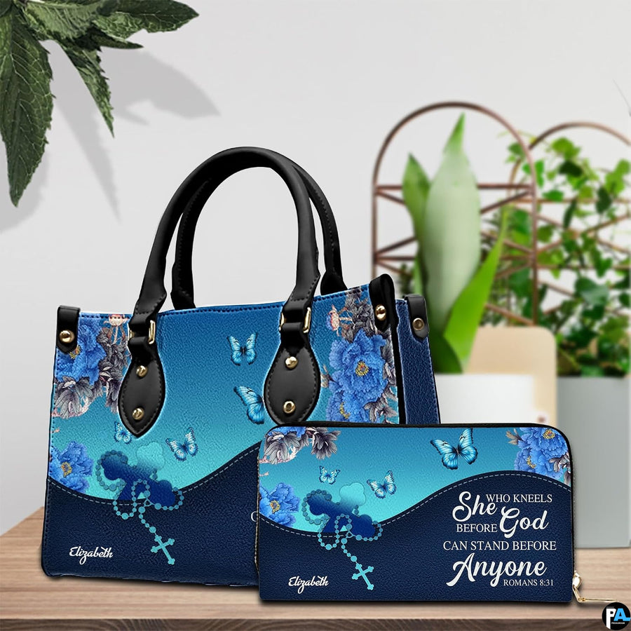 Handheld item and companion accessory with blue peony and rosary art placed together on wooden table near potted plant.