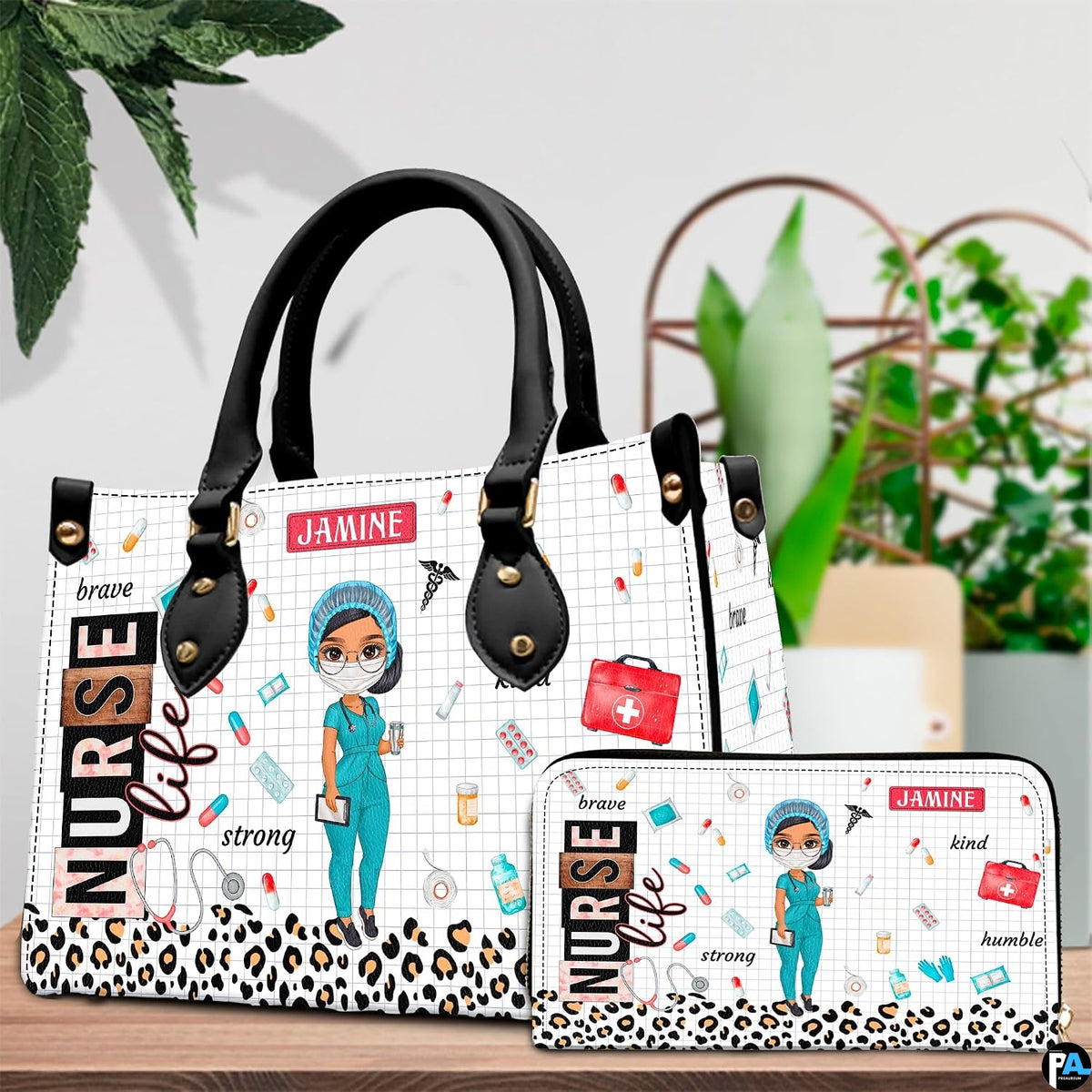 Chibi scrub cap nurse handbag and matching wallet set displayed on tabletop beside greenery.
