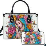 Front view of praying Virgin Mary handbag and matching wallet with turquoise mantle and rose garland.