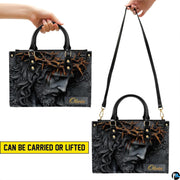 Interior view of open tote handbag showing spacious lining and compartments