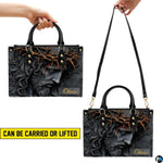 Interior view of open tote handbag showing spacious lining and compartments