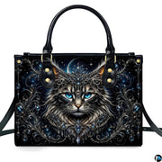 Front studio shot of crowned cat, sapphire blue eyes, crescent moon, and baroque filigree.